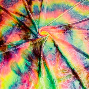 May include: A vibrant, tie-dye fabric with a swirling pattern. The fabric features a blend of colors, including pink, yellow, green, and blue, creating a psychedelic effect. The material appears soft and flowing, with visible folds and textures.