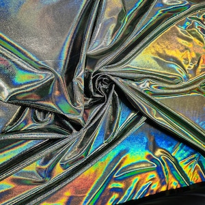 Iridescent foggy foil metallic hologram nylon spandex 4-way stretch 58/60” Sold by the YD.