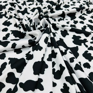Cow design exotic animal print on best quality of nylon spandex 4-way stretch 58/60”