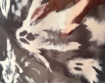 Halloween Ghost design print on best quality of nylon power mesh  spandex 4-way stretch 58/60” Sold by the YD. Ships worldwide from L.A