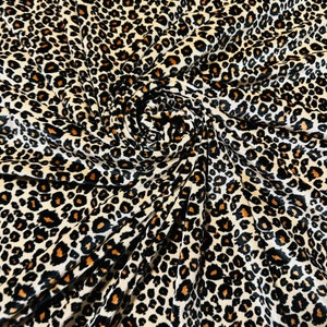 Cheetah design Exotic animal print on best quality of stretch velvet 4-way stretch 58/60” Sold by the YD.