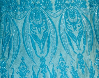 Luxury sequins Jlo design Embroidered on stretch mesh 4-way stretch 55/47” Sold by the YD.