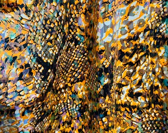 Exotic Leopard safari design hologram Orange/gold metallic nylon spandex 4-way stretch 58/60” High quality fabrics by EthanLASpandex