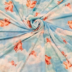 Celestial Angels design Sky Blue fashion brand nylon power mesh 4-way stretch 58/60” Sold by the YD. High quality fabrics by EthanLASpandex