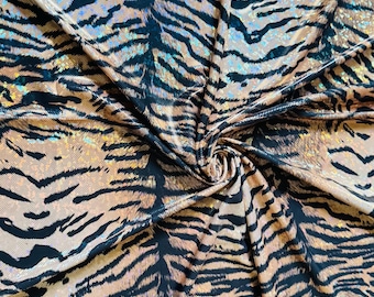 Tiger design exotic animal print on great quality of shattered glass hologram metallic nylon spandex 4-way stretch 58/60”