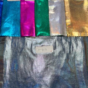 Iridescent all over foil metallic nylon spandex 4-way stretch 58/60” Sold by the YD. Ships worldwide from Los Angeles California USA