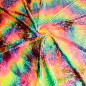 May include: A vibrant, tie-dye fabric with a swirling pattern. The fabric features a blend of colors, including pink, yellow, green, blue, and orange. The material appears soft and has a slight sheen, with visible folds and creases.