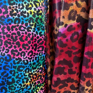 Leopard design Rainbow and metallic red leopard exotic animal print nylon spandex 4-way stretch 58/60” High quality fabrics by EthanLASpande