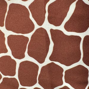 Giraffe design exotic animal print on best quality of heavy nylon spandex 4-way stretch 58/60” Sold by the YD. Ships worldwide from LA CA