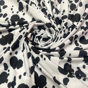 Dalmatian design exotic animal print on best quality of nylon spandex 4-way stretch 58/60”