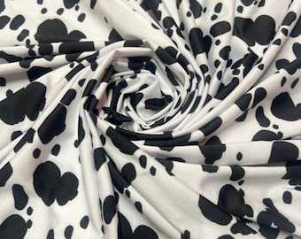 Dalmatian design exotic animal print on best quality of nylon spandex 4-way stretch 58/60”
