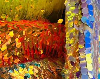 Luxury Teardrops design Jumbo sequins size embroidered on stretch mesh 2-way 58/60” Sold by the YD. Ships worldwide from Los Angeles Ca