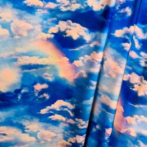 Celestial Clouds design sky blue rainbow  print on best quality of nylon spandex 4-way stretch 58/60”