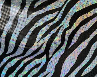 New Wild Zebra design on Hologram shattered glass metallic nylon spandex 4-way stretch 58/60” Sold by the YD.