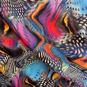 May include: A vibrant fabric with a swirling pattern of colors including blue, orange, pink, and purple. The design incorporates white dotted and striped elements, creating a dynamic and artistic textile.