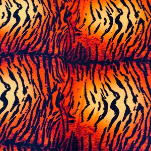 Puede incluir: Patr&oacute;n repetitivo de rayas de tigre. El dise&ntilde;o presenta gruesas rayas negras sobre un degradado de tonos naranja y amarillo, creando un efecto visual llamativo. Adecuado para diversas aplicaciones textiles.