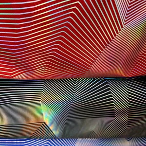 New Lacer lines design Iridescent metallic nylon spandex 4-way stretch 58/60” Sold by the YD. Ships worldwide from Los Angeles California US