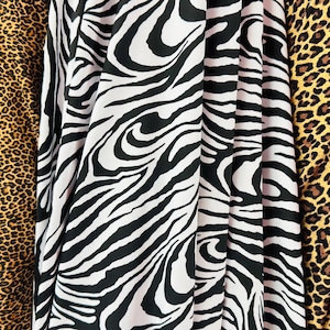 Animal Exotic Designs print on best quality of nylon spandex 4-way stretch 58/60” High Quality fabrics by EthanLASpandex