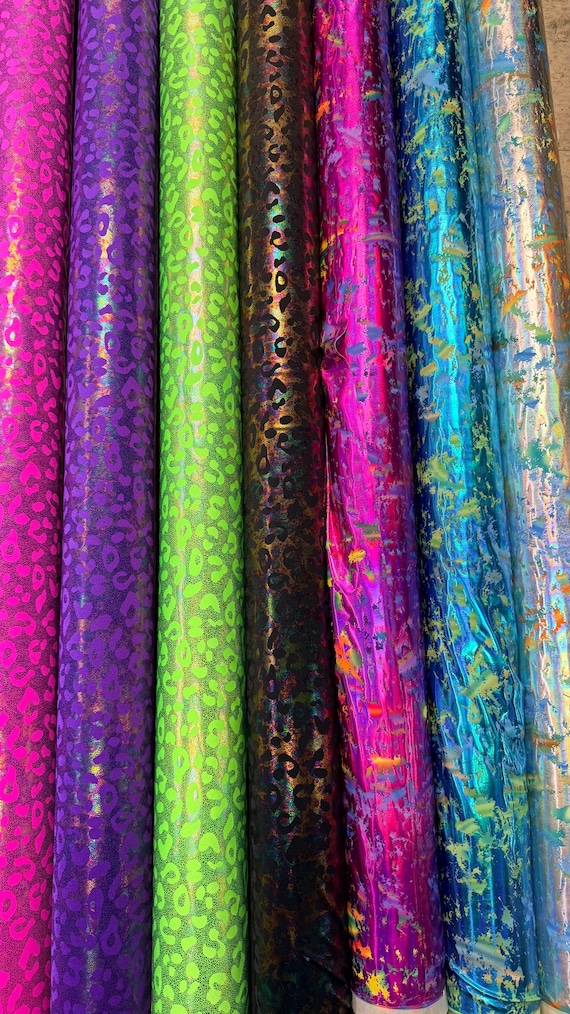 Leopard  and splattered paint design exotic animal print metallic nylon spandex 4-way stretch high quality fabrics  58/60” Sold by the YD.