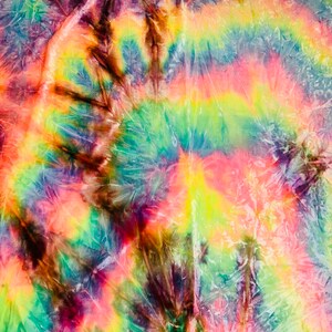May include: A vibrant tie-dye textile with a spiral pattern. The fabric features a blend of colors, including shades of yellow, pink, green, blue, and brown. The design has a textured appearance, with visible folds and creases in the material.
