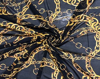 Nytt modemärkesdesign i svart/guldfärgat tryck på högkvalitativt power mesh-material i 4-vägs stretch 58/60”
