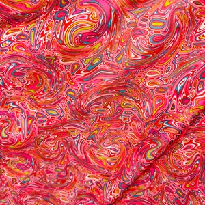 New abstract lava design multicolor print on great quality of nylon spandex  4-way stretch 58/60” Sold by the YD