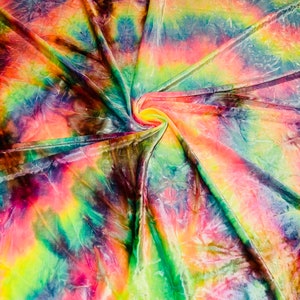 May include: A vibrant, tie-dye fabric with a swirling pattern. The fabric features a blend of colors, including pink, yellow, green, blue, and purple. The material is folded and gathered, creating a dynamic and textured appearance.