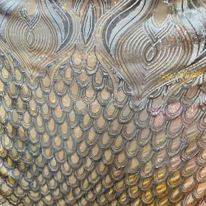 Peacock design deluxe embroidered sequins on stretch power mesh 4-way stretch 58/60”