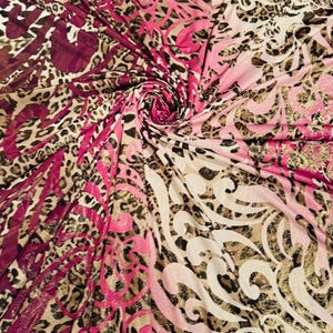 New Hiding Leopard design print on poly spandex with foil 4-way stretch 58/60” Sold by the YD. Ships Worldwide from Los Angeles California