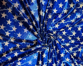 Luxury Freedom Stars design print on metallic hologram nylon spandex 4-way stretch 58/60” Sold by the YD. Ships worldwide from L.A