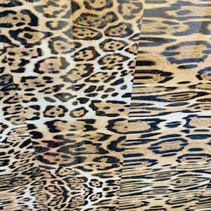 Exotic leopard design print on great quality of power mesh nylon spandex 4-way stretch 58/60” Sold by the YD. Ships worldwide from L.A