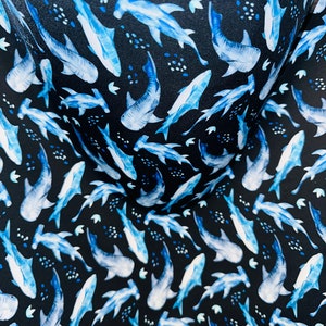 Multi Sharks design print on best quality of nylon spandex 4-way stretch 58/60” Sold by the YD. Ships worldwide from Los Angeles California