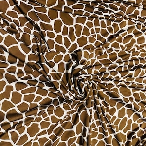 Giraffe design Exotic animal print on great quality of poly spandex 4-way stretch 58/60”