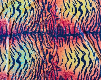 Tiger design exotic animal print on great quality of shattered glass hologram metallic nylon spandex 4-way stretch 58/60”