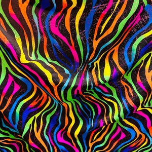 New Exotic Zebra design rainbow color print on best quality of nylon spandex with foil 4-way stretch 58/60”