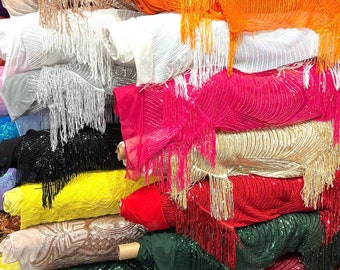 Chainette Fringe sequins embroidered on stretch mesh 4-way 55/57” Sold by the YD.