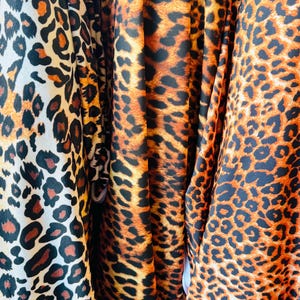 Exotic animal prints designs on best quality of nylon spandex 4-way stretch 58/60” Sold by the YD. Ships worldwide from Los Angeles Californ