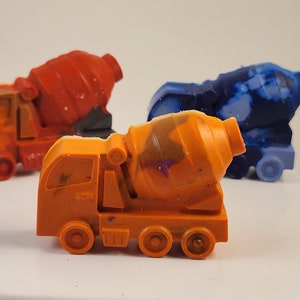 Unique construction truck and race car crayons