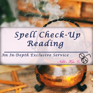 May include: A copper cauldron with a black handle sits on a wooden surface. Steam rises from the cauldron. The text "Spell Check-Up Reading" is above the cauldron, and the text "An In-Depth Exclusive Service" is below the cauldron. The text "Nikki's Hope Co." is in the bottom right corner of the image.