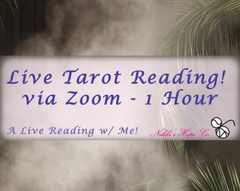 May include: An image with text that reads "Live Tarot Reading! via Zoom - 1 Hour". The text is in a purple script font on a light purple background. The bottom of the image reads "A Live Reading w/ Me!" with a logo.
