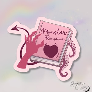 May include: Pink sticker with a pink book that says "Monster Romance" with a red devil hand holding the book and a pink octopus tentacle on the side.