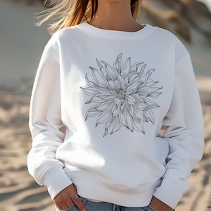 May include: White sweatshirt with a black line drawing of a large flower on the front.