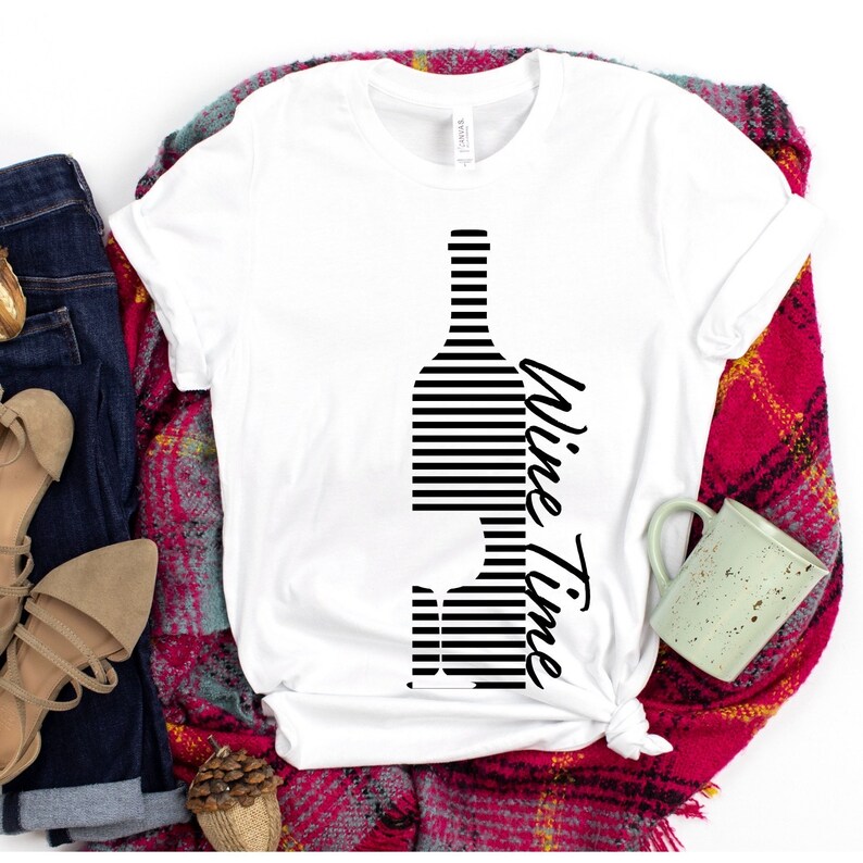 May include: White t-shirt with a black and white striped wine bottle graphic and the text "Wine Time" printed on the side.