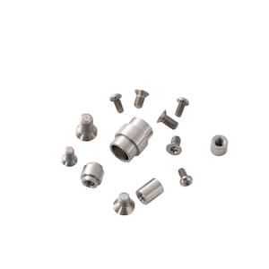 May include: A set of silver-toned metal screws and a silver-toned metal spacer. The screws are of various sizes and shapes.