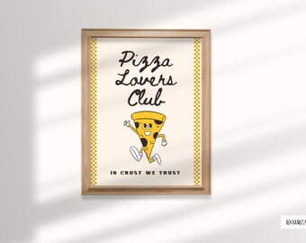May include: A framed print featuring a cartoon pizza slice wearing sunglasses and running. The text on the print reads "Pizza Lovers Club" and "In Crust We Trust".
