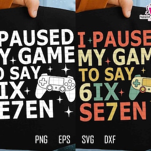 Puede incluir: Camiseta negra con el texto "I paused my game to say 6ix Se7en" en letras blancas y coloridas. El diseño incluye un gráfico de mando de juego y acentos de estrellas. La parte inferior de la camiseta muestra "PNG EPS SVG DXF".