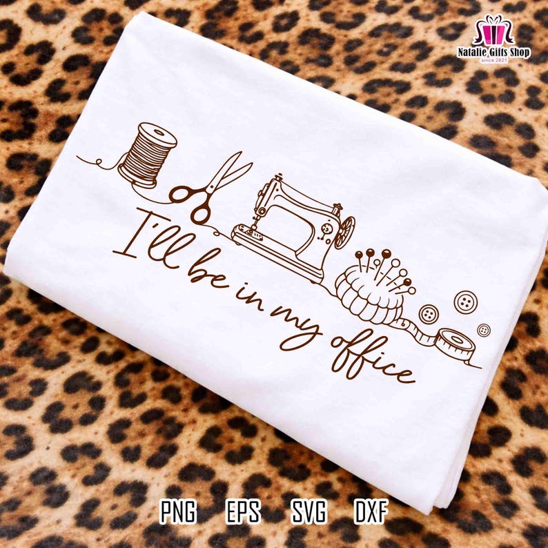 May include: A white ceramic mug with a black handle and the text "But First, Coffee" in a bold, black font. The mug is set against a blurred background, suggesting a cozy setting. The mug appears to be approximately 4 inches tall.