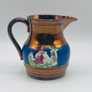 ANTIQUE LUSTRE WARE milk jug, pitcher or creamer, Made in England, Antique Copper Lustre ware blue handpainted relief band height 9 cm