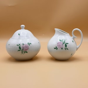 Azucarero y lechera de porcelana Rosenthal vintage, con relieve y decoración de rosas.
