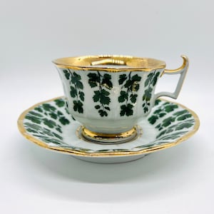 Meissen Porcelain Tea Cup and Saucer: Antique Green Ivy, Gilded London Handle